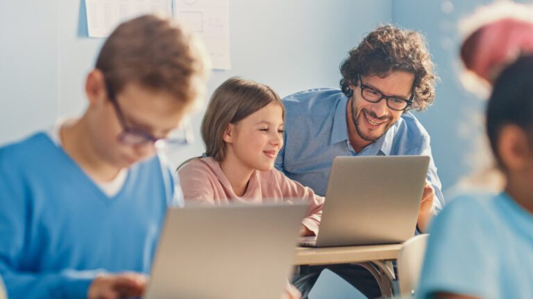 male teacher with female young student